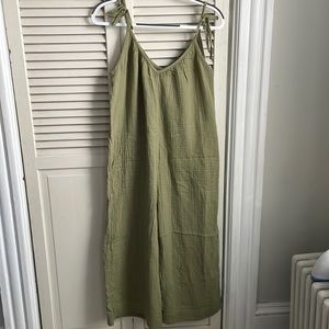 Light olive green cropped tie-shoulder romper.